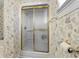 Bathroom featuring glass shower doors, floral wallpaper and neutral finishes at 414 Staghorn Ln., Longs, SC 29568