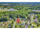Aerial view of a residential neighborhood with mature trees, well-maintained yards, and a mix of home styles at 431 Brandymill Blvd, Myrtle Beach, SC 29588