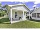 View of the home's porch and white siding at 431 Brandymill Blvd, Myrtle Beach, SC 29588