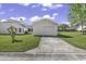 View of the home's siding and detached garage at 431 Brandymill Blvd, Myrtle Beach, SC 29588