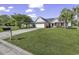 Charming single-story home featuring a well-manicured lawn and attached two-car garage at 431 Brandymill Blvd, Myrtle Beach, SC 29588