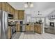 Kitchen featuring stainless steel appliances, tile floors, and granite countertops at 431 Brandymill Blvd, Myrtle Beach, SC 29588