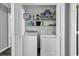 Laundry room with washer, dryer and storage shelves at 431 Brandymill Blvd, Myrtle Beach, SC 29588