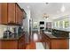 Gourmet eat-in kitchen boasts stainless steel appliances, granite countertops, and hardwood floors at 465 Tavistock Ct., Murrells Inlet, SC 29576