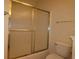 Bathroom featuring sliding glass door shower and toilet at 5020 Windsor Green Way # 302, Myrtle Beach, SC 29579