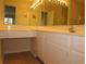 Bathroom featuring vanity with seated area, mirror and tiled floor at 5020 Windsor Green Way # 302, Myrtle Beach, SC 29579