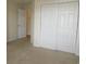 Bedroom featuring carpet and a closet with sliding doors at 5020 Windsor Green Way # 302, Myrtle Beach, SC 29579