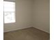 Bedroom with carpet and a window providing natural light at 5020 Windsor Green Way # 302, Myrtle Beach, SC 29579