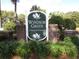 Community entrance sign for Windsor Green at Waterford Plantation, framed by brick pillars at 5020 Windsor Green Way # 302, Myrtle Beach, SC 29579
