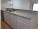 Kitchen featuring white cabinets and granite countertops at 5020 Windsor Green Way # 302, Myrtle Beach, SC 29579