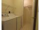 Laundry room with a washer and dryer, and a storage area at 5020 Windsor Green Way # 302, Myrtle Beach, SC 29579