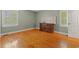 Cozy bedroom featuring hardwood floors, natural light, and a classic design at 5033 Brantwood Dr., Mullins, SC 29574