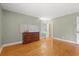 Bedroom with hardwood floors, ample natural light, and neutral wall color at 5033 Brantwood Dr., Mullins, SC 29574