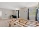 Bedroom with wood flooring, a desk, and unique window coverings, bathed in natural light at 5033 Brantwood Dr., Mullins, SC 29574