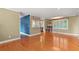 Open layout showcasing the living area with hardwood floors connecting to the kitchen at 5033 Brantwood Dr., Mullins, SC 29574