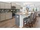 Modern kitchen featuring stainless steel appliances, a large island and granite countertops at 5039 Gladstone Dr, Conway, SC 29526