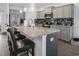 Modern kitchen featuring stainless steel appliances, a large island and granite countertops at 5039 Gladstone Dr, Conway, SC 29526