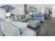 Spacious living room with comfortable seating, an open floor plan and modern decor at 5039 Gladstone Dr, Conway, SC 29526