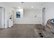 Loft area with neutral walls, plush carpeting, and a comfortable reclining sofa at 5039 Gladstone Dr, Conway, SC 29526