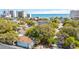 The aerial view shows a home nestled amongst mature trees, close to the beach and amenities at 504 A S 19Th Ave. S, North Myrtle Beach, SC 29582