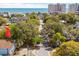 An aerial view shows proximity to the ocean with mature trees lining a quiet street at 504 A S 19Th Ave. S, North Myrtle Beach, SC 29582