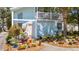 Charming home exterior adorned with potted flowers and a lovely front porch at 504 A S 19Th Ave. S, North Myrtle Beach, SC 29582