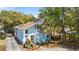 Charming two-story home with light blue exterior, a balcony, and front yard landscaping at 504 A S 19Th Ave. S, North Myrtle Beach, SC 29582