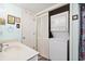 Compact laundry area featuring a stacked washer and dryer unit at 504 A S 19Th Ave. S, North Myrtle Beach, SC 29582