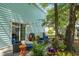 Inviting patio area with outdoor seating amidst lush greenery and hanging lights at 504 A S 19Th Ave. S, North Myrtle Beach, SC 29582