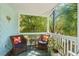 Relaxing porch with comfortable seating and a view of lush greenery at 504 A S 19Th Ave. S, North Myrtle Beach, SC 29582