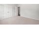 Bedroom featuring a closet and doorway, neutral walls, and carpet flooring at 512 Charlton Blvd., Georgetown, SC 29440