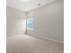 Carpeted bedroom with a window offering plenty of natural light at 512 Charlton Blvd., Georgetown, SC 29440