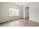 Dining room with wood floors, a chandelier, and a window overlooking the backyard at 512 Charlton Blvd., Georgetown, SC 29440