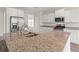 Spacious kitchen featuring granite countertops, stainless steel appliances, and white cabinetry at 512 Charlton Blvd., Georgetown, SC 29440