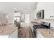 Bright kitchen features stainless steel appliances, granite counters, and ample cabinet space at 512 Charlton Blvd., Georgetown, SC 29440