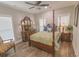 Comfortable bedroom featuring a four-poster bed and plenty of natural light at 521 Oak Lawn Rd., Georgetown, SC 29440