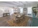 Bright and open dining area featuring a stylish light fixture and ample natural light at 521 Oak Lawn Rd., Georgetown, SC 29440