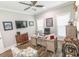 Bright home office with ample workspace and a comfortable seating area at 521 Oak Lawn Rd., Georgetown, SC 29440