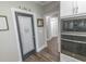 Charming pantry with decorative door and plenty of storage at 521 Oak Lawn Rd., Georgetown, SC 29440