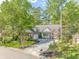 Charming brick home with a manicured front yard and welcoming entrance at 5647 S Blackmoor Dr., Murrells Inlet, SC 29576