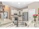 Bright kitchen with stainless steel appliances, granite countertops, and a functional layout, perfect for cooking at 5647 S Blackmoor Dr., Murrells Inlet, SC 29576