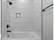 Beautiful bathroom with modern shower, white tile, and modern fixtures at 6001 S Kings Hwy., Myrtle Beach, SC 29575