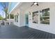 Spacious deck with a ceiling fan, overlooking the neighborhood with plenty of natural light at 6001 S Kings Hwy., Myrtle Beach, SC 29575