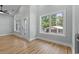 Living room with an abundance of natural light and luxury vinyl plank flooring at 6001 S Kings Hwy., Myrtle Beach, SC 29575