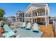 Beautiful open-air deck with table, seating, and view at 6001-1205 S Kings Hwy., Myrtle Beach, SC 29575