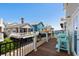 Gorgeous balcony with wooden flooring overlooking houses and ocean at 6001-1205 S Kings Hwy., Myrtle Beach, SC 29575