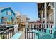 View from the balcony with Adirondack chairs and ocean view at 6001-1205 S Kings Hwy., Myrtle Beach, SC 29575