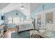 Tranquil bedroom featuring a ceiling fan, comfortable seating, and bright decor at 6001-1205 S Kings Hwy., Myrtle Beach, SC 29575