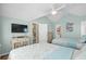 Spacious bedroom with two beds, flat screen tv, ensuite bath, and vaulted ceilings offer comfort and style at 6001-1205 S Kings Hwy., Myrtle Beach, SC 29575