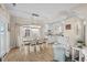 Dining area featuring a decorative chandelier, a table with seating, and an open layout at 6001-1205 S Kings Hwy., Myrtle Beach, SC 29575